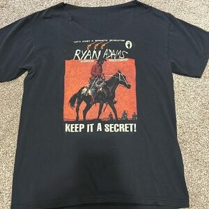 Ryan Adams T-shirt, neck cut out in v shape, fits size small to medium lady.